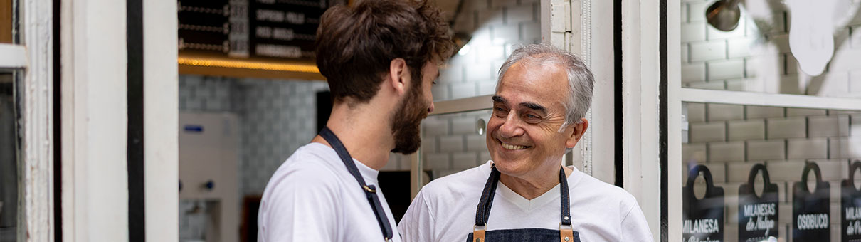 two chefs smiling